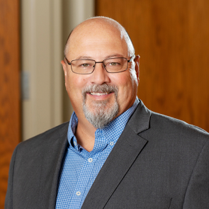 Portrait of team member Tim Bock smiling